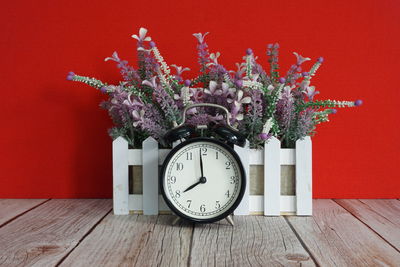 Close-up of alarm clock on table