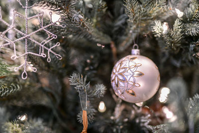 Close-up of christmas decoration hanging on tree