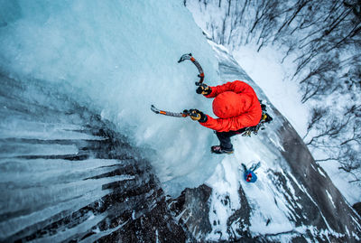 Man skiing on snow covered mountain