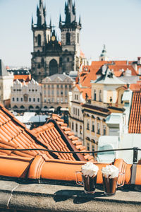 Buildings in city against sky