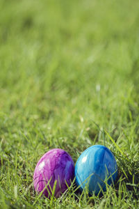 Close-up of easter egg on field