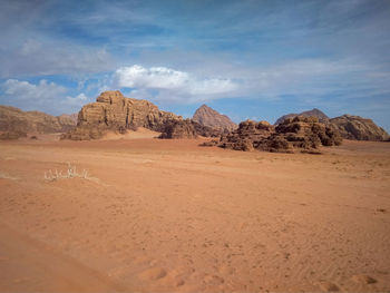 Scenic view of desert against sky