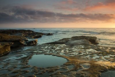 Scenic view of sea against sky during sunset