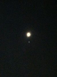 Low angle view of moon in sky