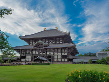 Building against cloudy sky