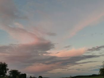 Low angle view of dramatic sky during sunset