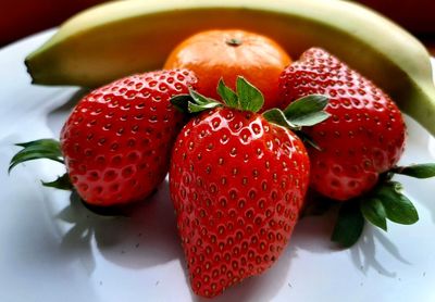 High angle view of strawberries on table