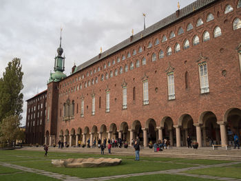 Tourists in front of historical building