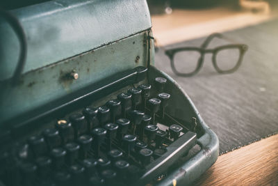 Close-up of typewriter on table