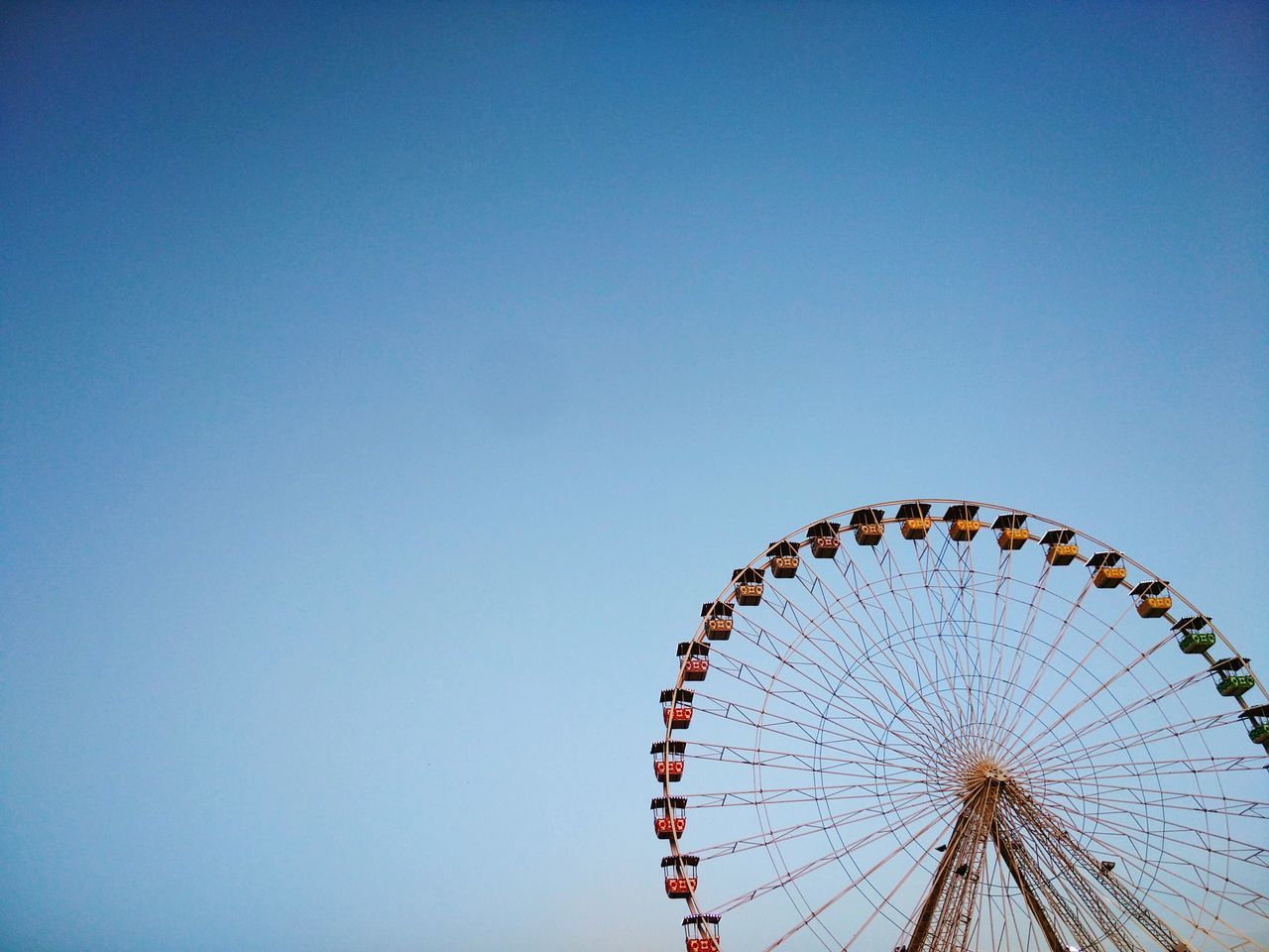 LOW ANGLE VIEW OF FERRIS WHEEL AGAINST SKY