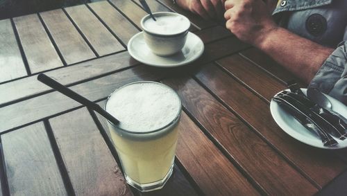 High angle view of coffee cup on table