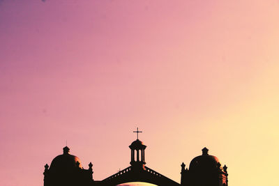 High section of church against clear sky at sunset