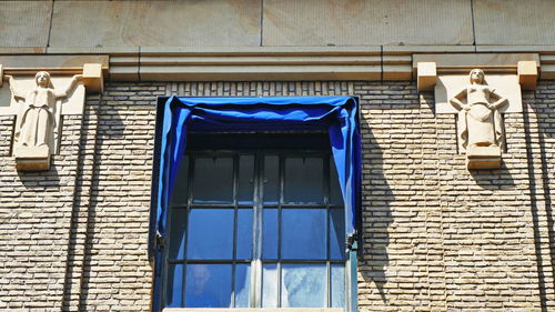 Low angle view of window of building