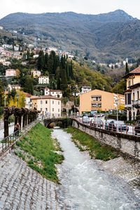 River amidst buildings in town