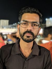 Portrait of man standing outdoors