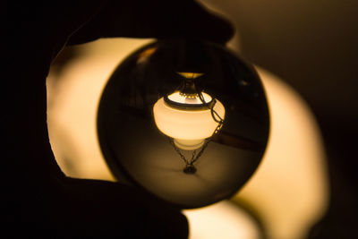 Close-up of illuminated light bulb