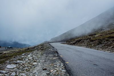 Road on mountain against sky