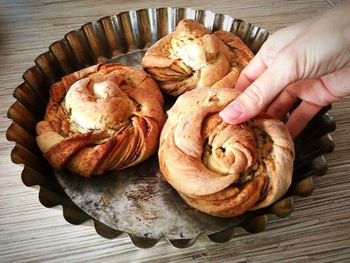 Close-up of hand holding bread