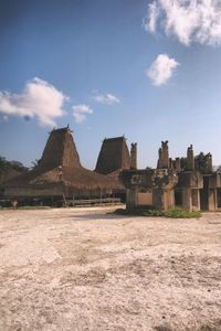 View of temple against cloudy sky