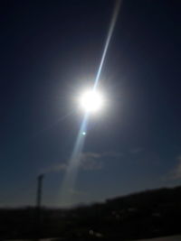 Low angle view of bright sun