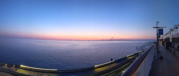 Panoramic view of sea against sky during sunset