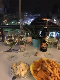 High angle view of wine glasses on table at restaurant