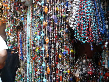 Necklaces hanging for sale in market