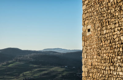 View of built structure against clear blue sky