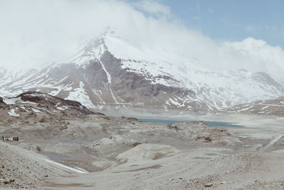 Scenic view of snowcapped mountain against sky