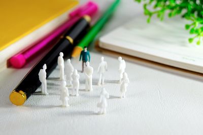 High angle view of figurines on table