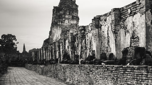 Old ruins of building against sky