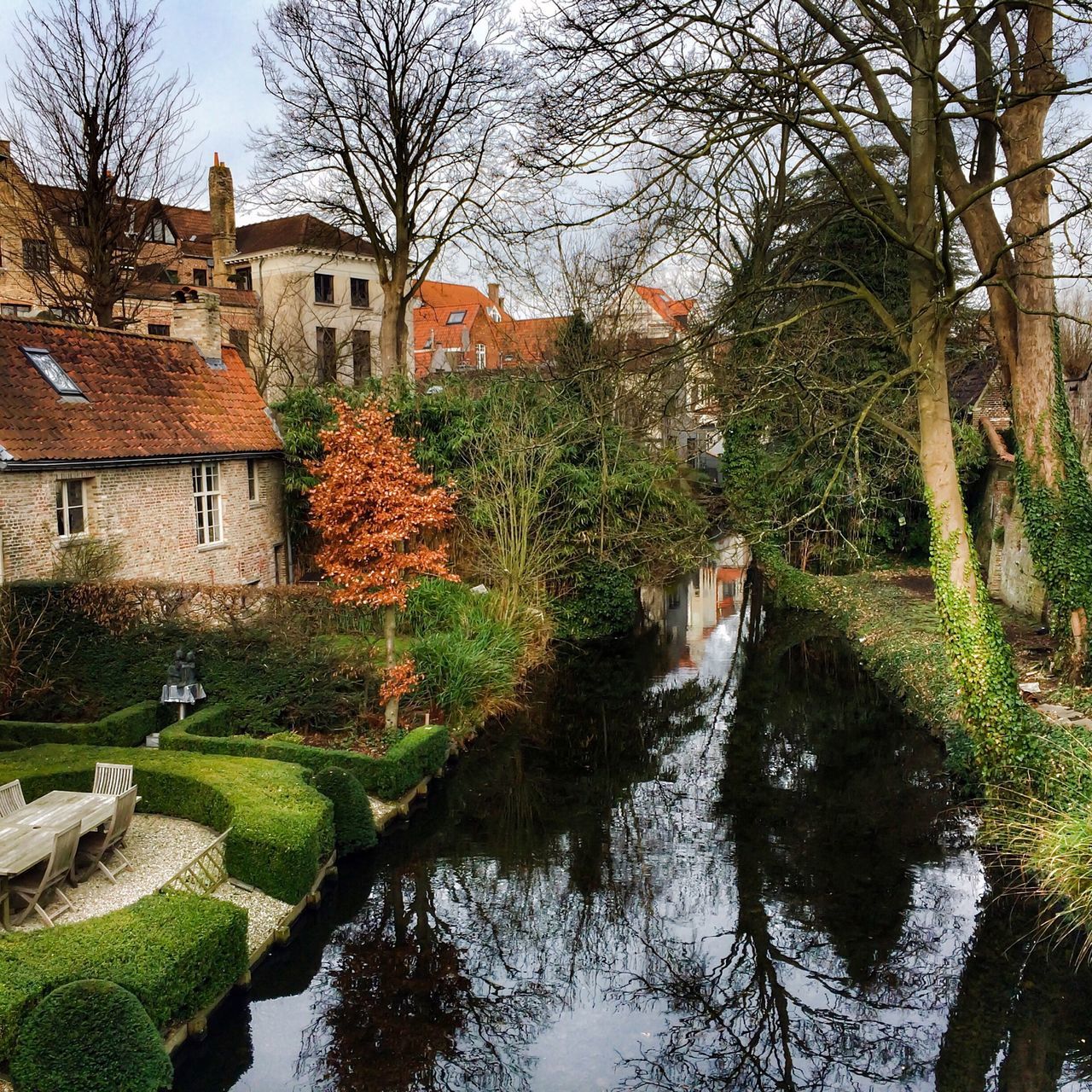 building exterior, architecture, built structure, water, tree, canal, house, waterfront, reflection, residential building, river, residential structure, bare tree, sky, branch, lake, day, incidental people, outdoors, town