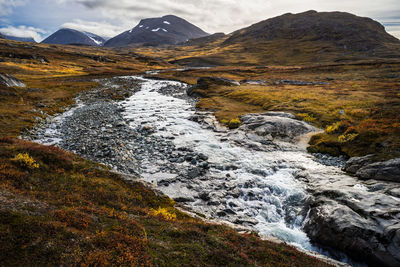 Stream flowing through rocks