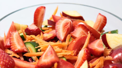 Close-up of chopped fruits in plate