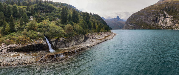 Scenic view of river against mountains