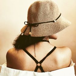 Rear view of woman wearing hat