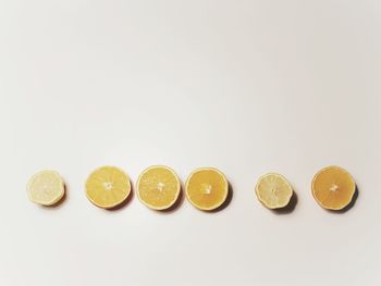 Close-up of coins on white background