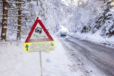 Road sign in snow