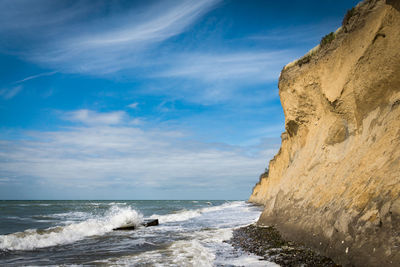 Scenic view of sea against blue sky