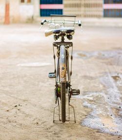 Close-up of bicycle on road