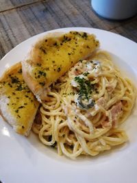 Close-up of noodles served in plate on table