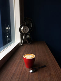 Close-up of coffee cup on table