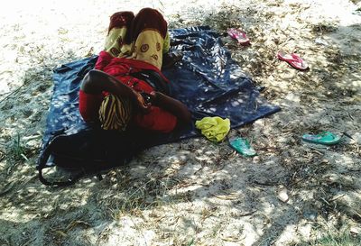 High angle view of girl playing in snow