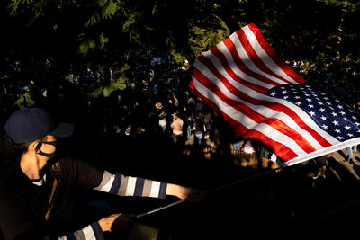 High angle view of man holding flag