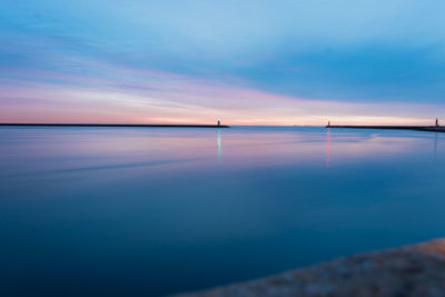 Scenic view of sea against sky at sunset