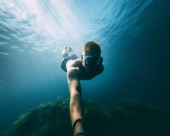 Man snorkeling in sea
