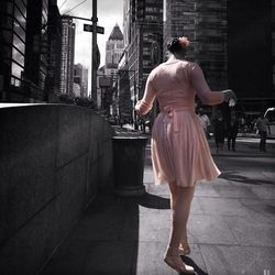 Woman standing in city