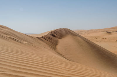 Scenic view of desert against sky