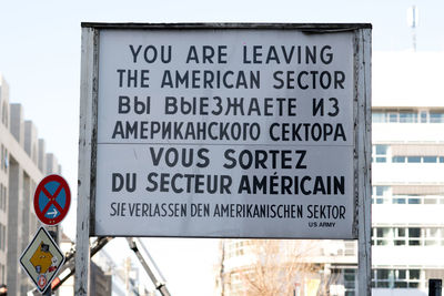 Close-up of warning sign on road