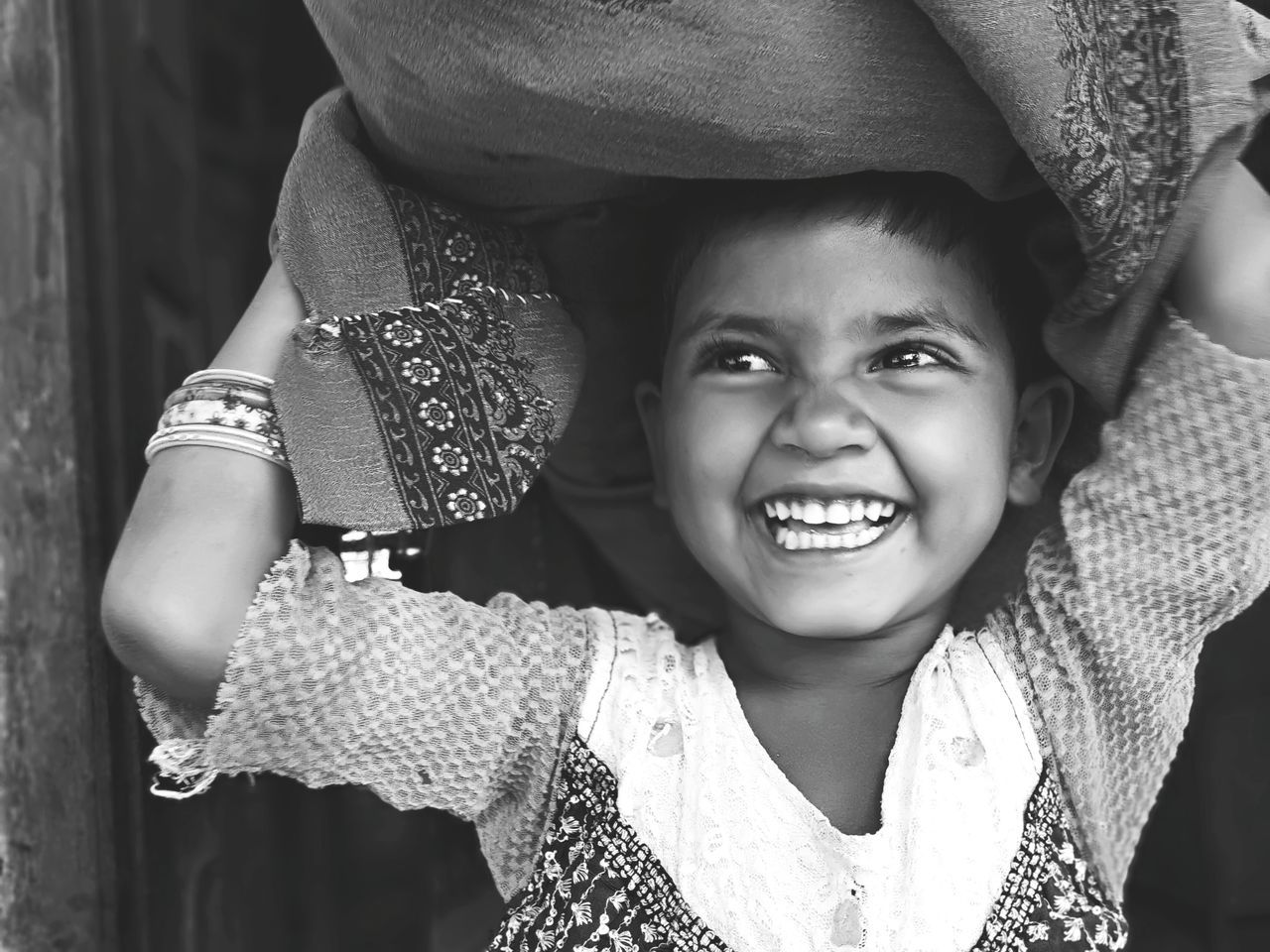 PORTRAIT OF A SMILING GIRL